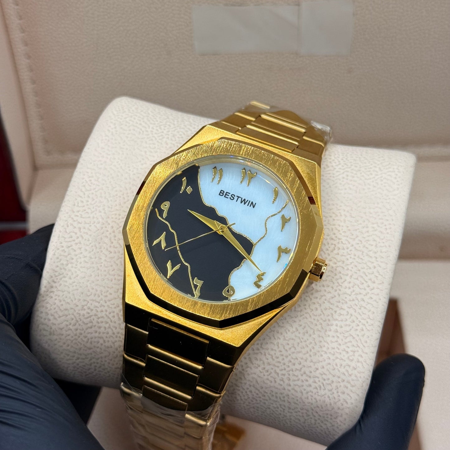 Aura stain less steel golden with marble dial